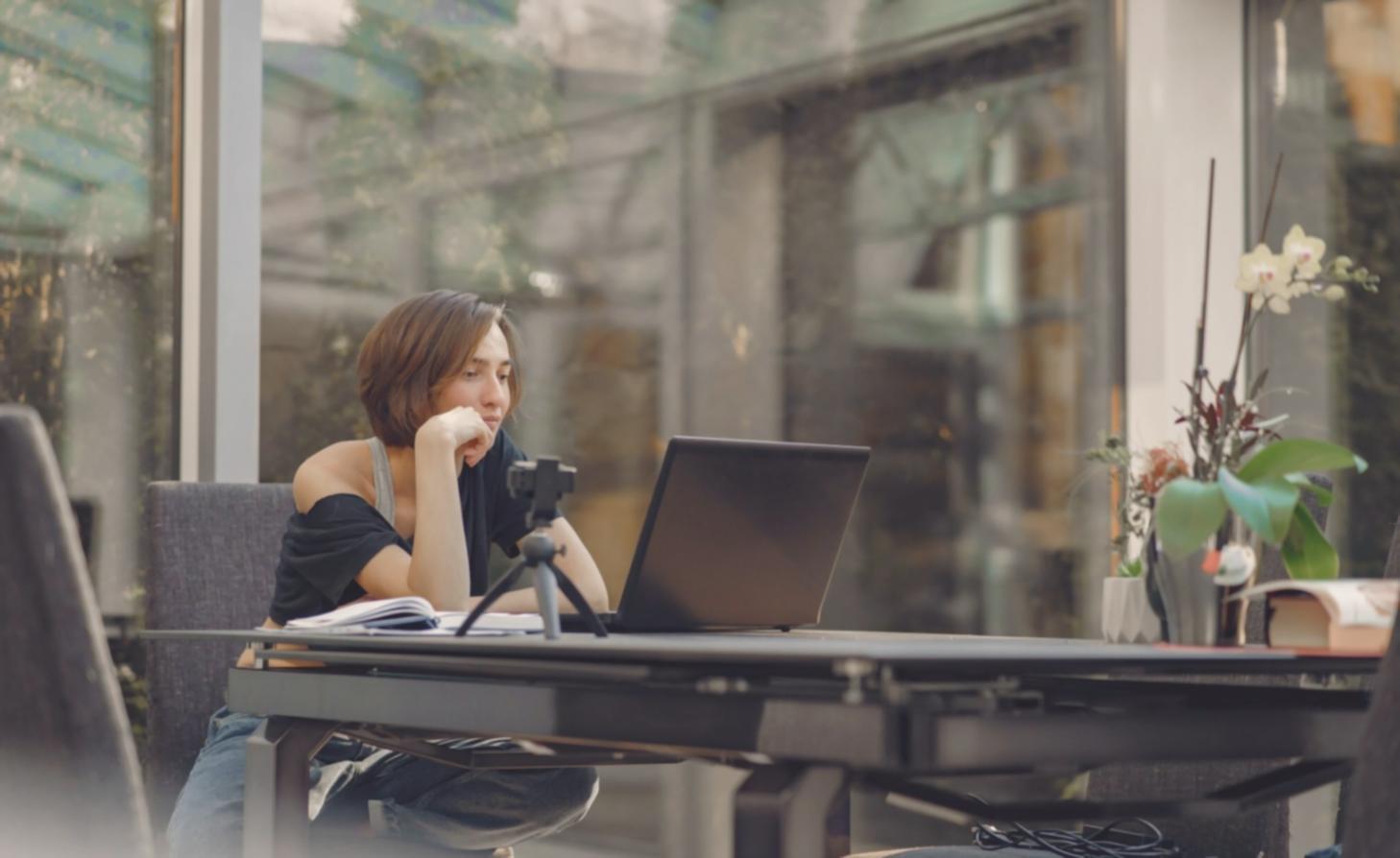 Modern workspace with financial planning materials and laptop